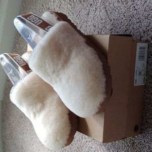 Brand new with box UGG Fluff yeah clog. Kids size 4 which is womens size 6.
